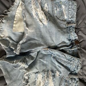 Distressed Light Blue Denim Shorts
